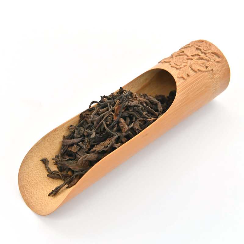 Select Aged Brown Pu'er in a scoop